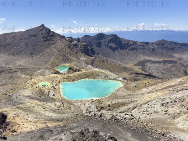 On the hiking trail of the Tongariro Alpine Crossing in Tongariro National Park with a view of the