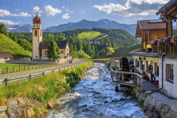 Chaplaincy church and old forge with water wheel on the Horlachbach, Niederthai in the Horlach