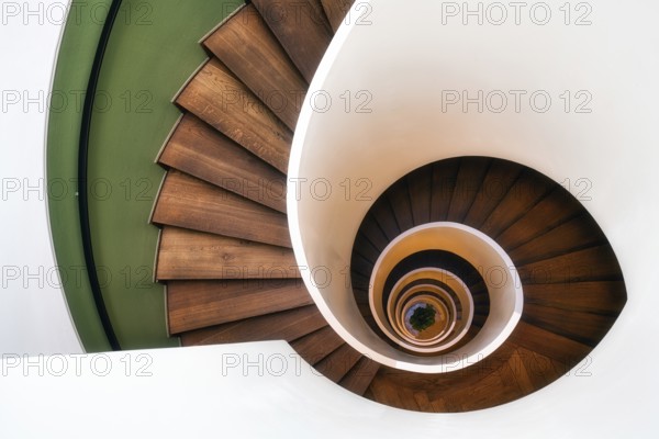 Spiral staircase with wooden steps, old staircase, Zurich, Switzerland
