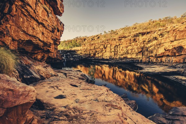 Bell Gorge waterfall, a body of water in north-west Australia in the Kimberley. Sunrise in the
