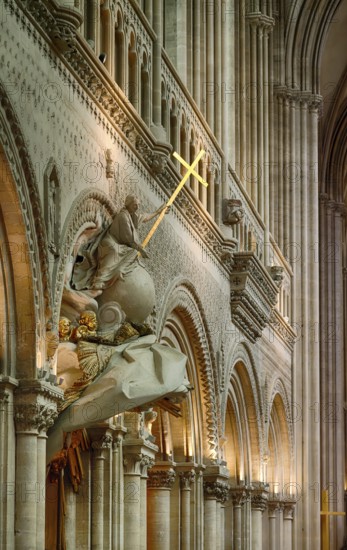 Interior view, angel on pulpit, holding a shining golden sword, Cathédrale Notre-Dame de Bayeux,