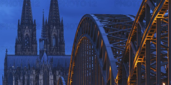 Cologne Cathedral and the Hohenzollern Bridge illuminated with LED lights, Cologne, North