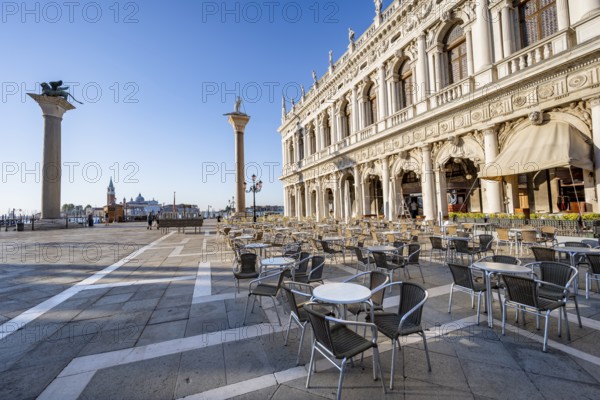Chairs and tables of cafes at Piazetta San Marco, Colonna di San Marco and Colonna di San Todaro,