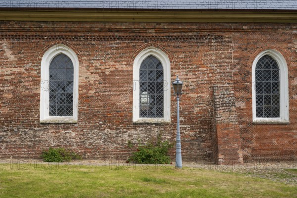 Brick façade with window, St Laurentius Church, town church, market, old town, Tönning, North