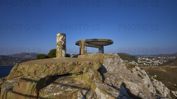 An abandoned concrete ruin on a rocky hill with a wide view over the landscape, Lost Place, Lago