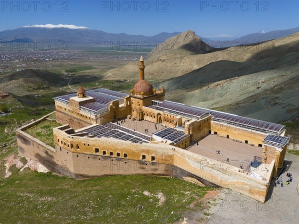 Large fortress in a mountainous landscape with a dome and expansive views, aerial view, Ishak Pasha
