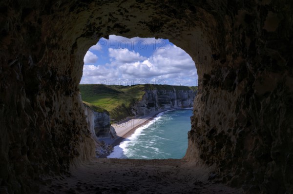 View through the eye of the panda, L'oeil du Panda, rock window, cave, in the rock arch Falaise