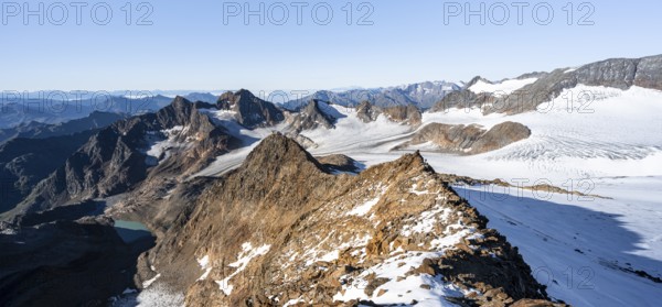 Rocky ridge on the Wilder Freiger mountain peak, behind Signal summit and Becher summit with