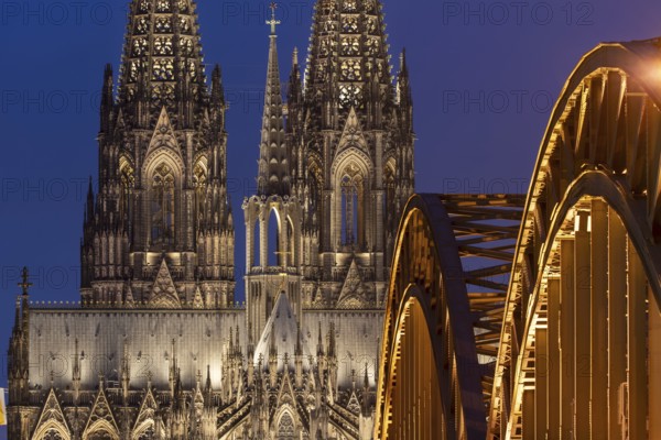Cologne Cathedral and the Hohenzollern Bridge illuminated with LED lights, Cologne, North