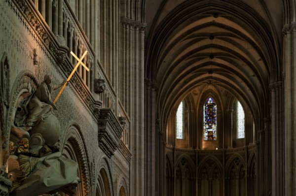 Interior view, angel on pulpit, holding a shining golden sword, Cathédrale Notre-Dame de Bayeux,