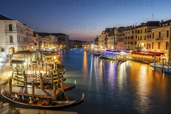 View of the Grand Canal at the blue hour, picturesque evening mood with illuminated palazzos on the