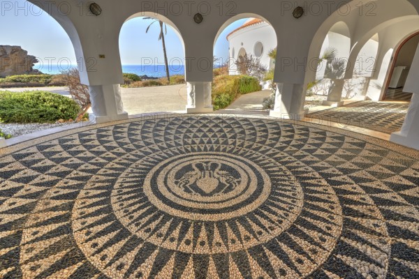 An artistically designed mosaic floor in a round room with a view, Kalithea, Kallithea, thermal