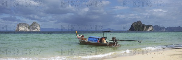 Longtail boat on the beach, Koh Ngai Island, Andaman Sea, Satun Province, Southern Thailand,