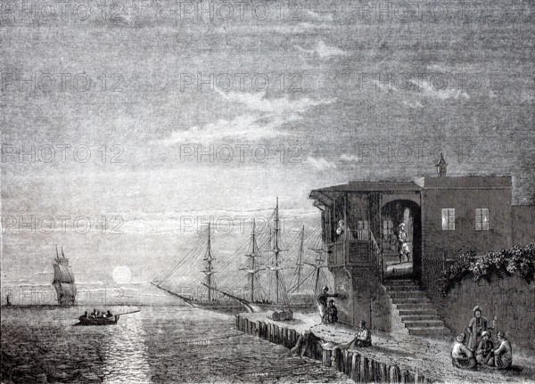 Turkish coffee house at the harbour of Rhodes in the evening, in 1870, Greece, digitally enhanced