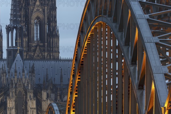 Cologne Cathedral and the Hohenzollern Bridge illuminated with LED lights, Cologne, North