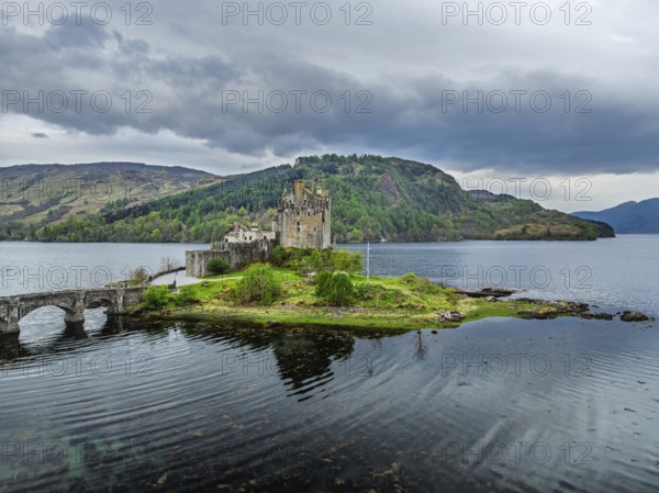 Eilean Donan Castle and Loch Duich from a drone, Isle of Skye, Highlands, Scotland, England, United