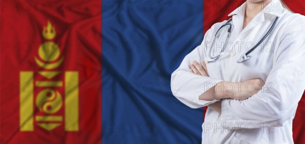 Doctor with crossed arms on Mongolia flag. Mongolia health and care concept. Female doctor on