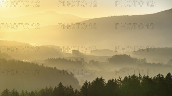 Landscape with forest, meadows and mountains around the town of Bad Kötzting, with a part of the