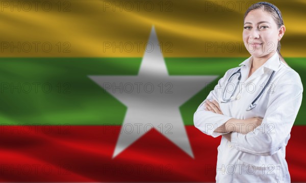 Female doctor on Myanmar flag. Doctor with crossed arms on Myanmar flag. Myanmar health and care