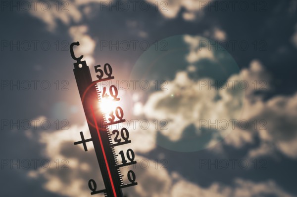 Symbolic image heat wave, thermometer in the sun, summer, climate change, temperature, record heat,
