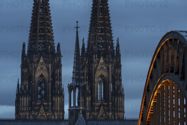 Cologne Cathedral and the Hohenzollern Bridge illuminated with LED lights, Cologne, North