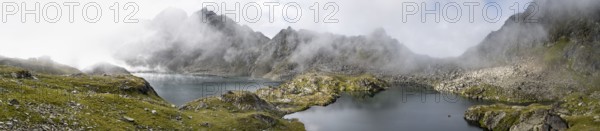 Mountain lakes Wangenitzsee and Kreuzsee, cloudy mountain peaks in the morning, Schober group, Hohe