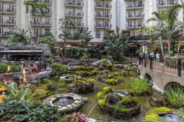 Guests dining at the Cascades American Cafe inside Gaylord Opryland Resort and Convention Center in