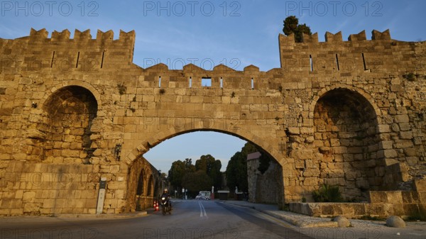 Arsenal gate, Rhodes city wall, Historic stone city gate in evening light, Harbour area, Rhodes