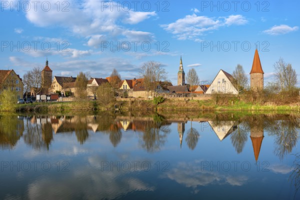 View of the old town in the evening light, Upper Tor, Liebfrauenmünster and Bürgerturm reflected in