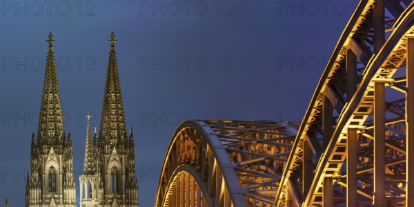Cologne Cathedral and the Hohenzollern Bridge illuminated with LED lights, Cologne, North