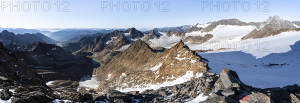 Rocky ridge on the Wilder Freiger mountain peak, behind Signal summit and Becher summit with