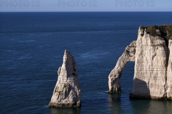 Rock arch Falaise or Porte d'Aval and rock needle Aiguille, Étretat, sea, steep coast, cliffs,