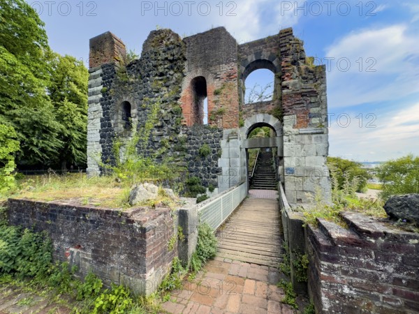 View from the location of the northern tower over a small bridge to the ruins of the imperial