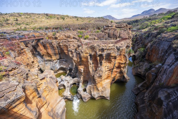 Canyon with steep orange-coloured cliffs with the Blyde River, Bourke's Luck Potholes, Panorama