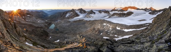 Panorama at sunrise with sun star, high mountain landscape, view of blue glacial lakes, mountain
