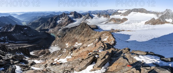 Rocky ridge on the Wilder Freiger mountain peak, behind Signal summit and Becher summit with