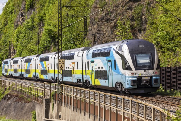 Train of the Austrian Westbahn en route on the winding railway line of the Geislinger Steige.