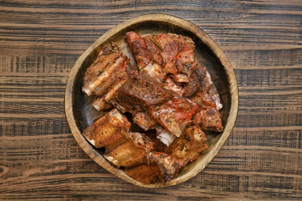 Tender short beef ribs are perfectly roasted in the oven, showcasing a rich, savory flavor. The