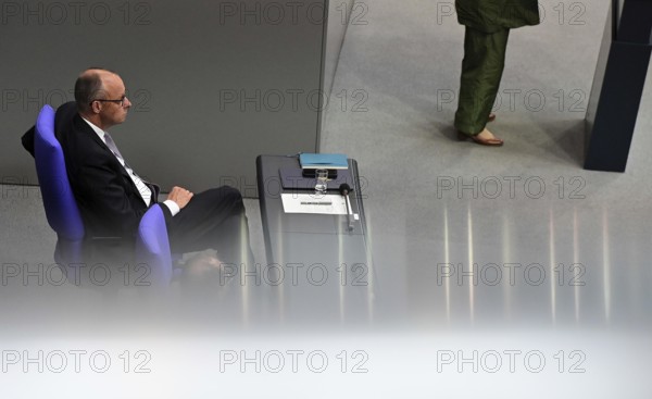 Federal Chancellor Friedrich Merz (CDU) and parts of his cabinet sit on the government bench,