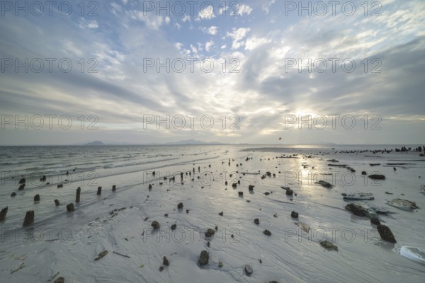 Structures in the sand at sunrise on Sivalai Beach, Koh Mook Island, Satun Province, Southern