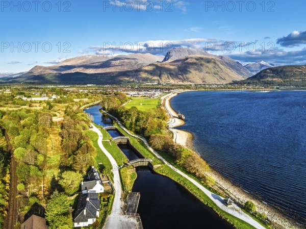 View of Caledonian Canal, Caol Beach and Nevis Range Mountains from a drone, Corpach, Fort William,