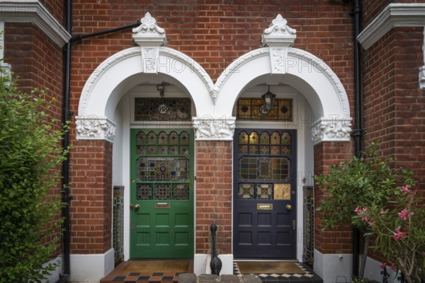 Victorian house entrances, blue and green doors, brick building, Kensington, London, England, Great