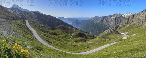 Panoramic view of southern ramp southern ascent mountain road alpine road to pass in Alps High Alps