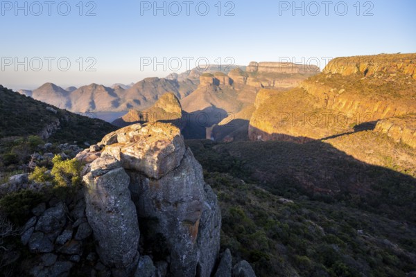 Sunset at Blyde River Canyon with Three Rondawels peak, view of canyon with Blyde River and table