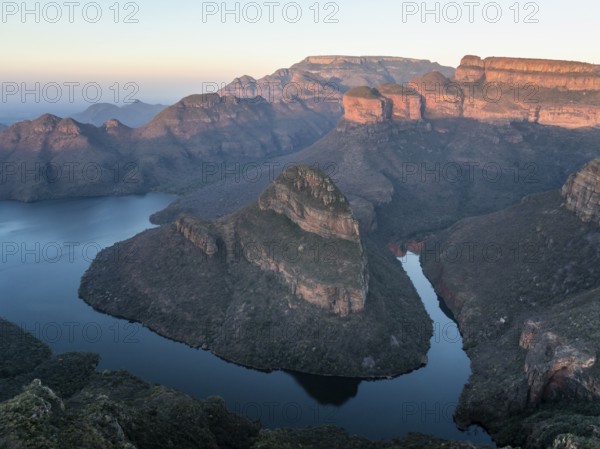Sunset at Blyde River Canyon with Three Rondawels peak, view of canyon with Blyde River and table