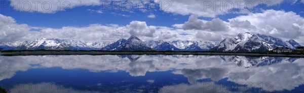 Mountain lake with alpine panorama, snow pond Finkenberg, Penken, Mayrhofen, Zillertal, Tyrol,