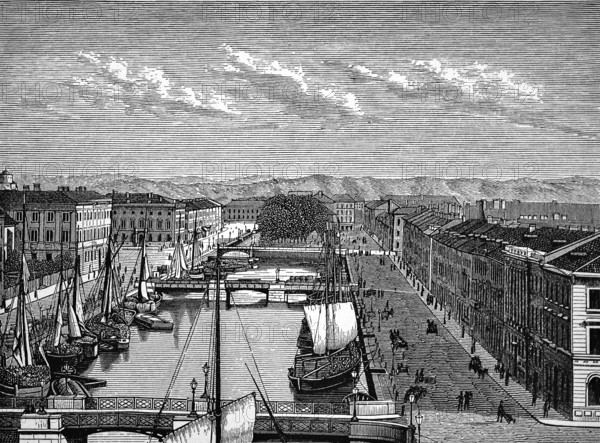 Old town of Gothenburg at the river Göta älv, wide promenade, bridges, numerous cargo ships,