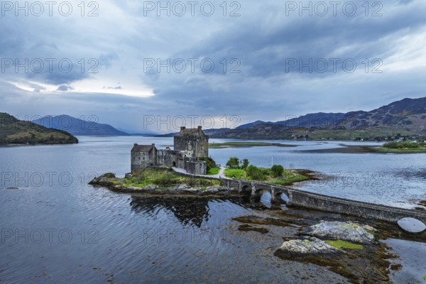 Eilean Donan Castle and Loch Duich from a drone, Isle of Skye, Highlands, Scotland, England, United