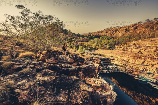 Bell Gorge waterfall, a body of water in north-west Australia in the Kimberley. Sunrise in the