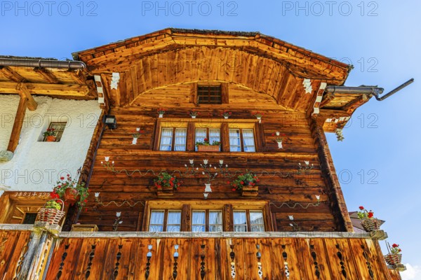 Parsonage, decorated with flowers, historic village centre, Grimentz, Val d'Anniviers, Valais Alps,